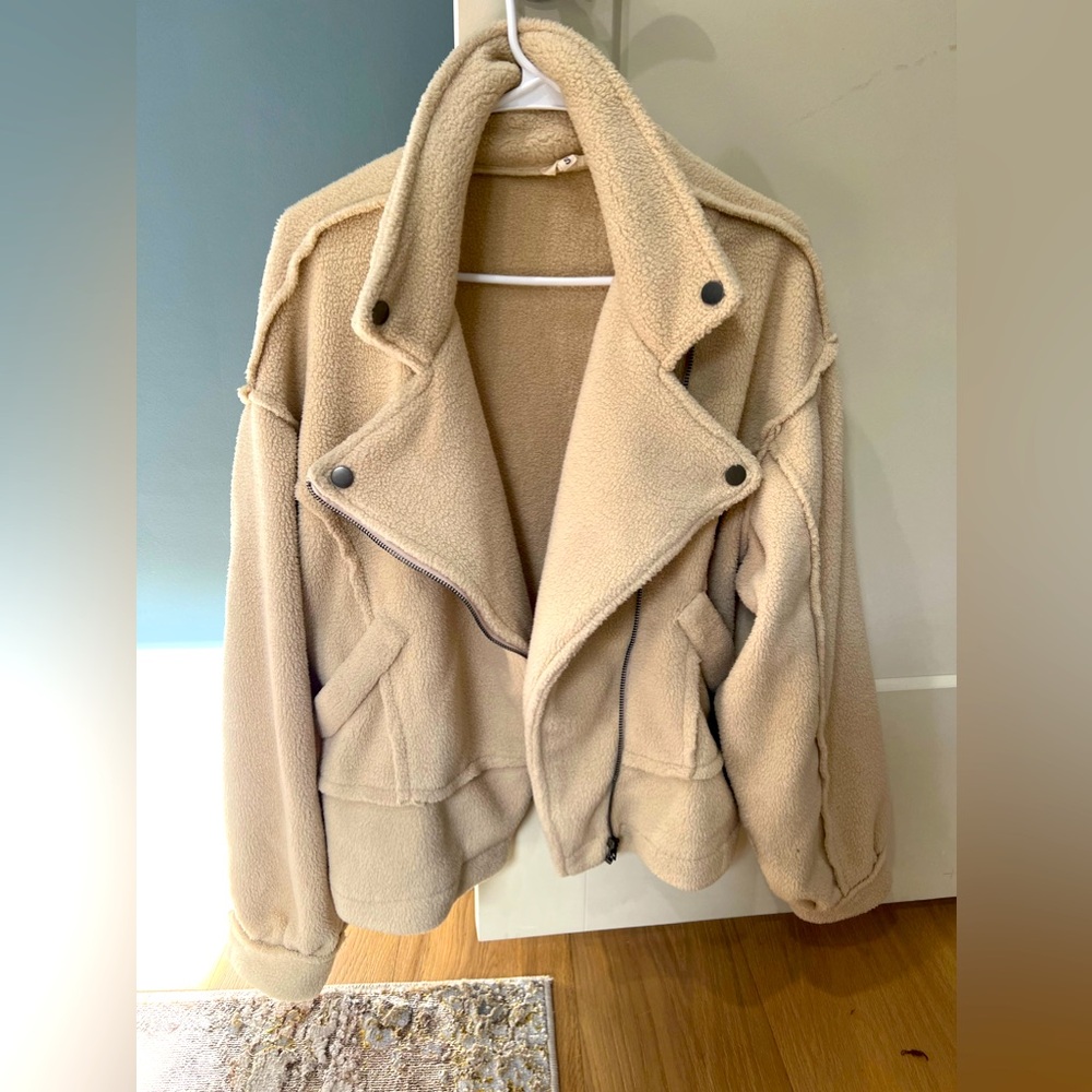 Pol size small jacket oversized cream. It’s kind of like a Sherpa.